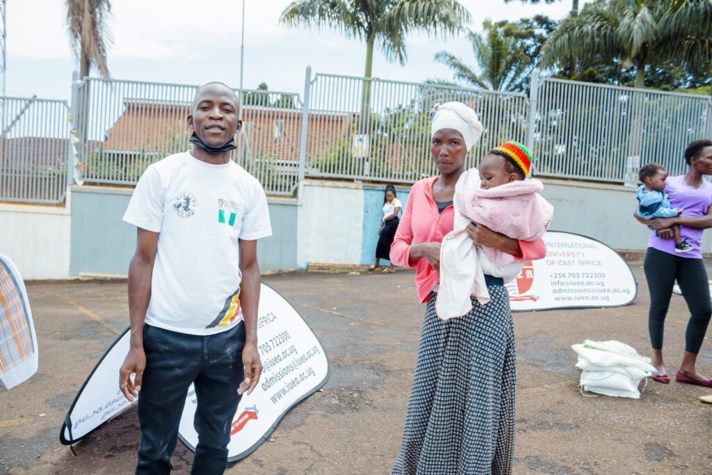 Mr. Ssali Gerald and a young mother