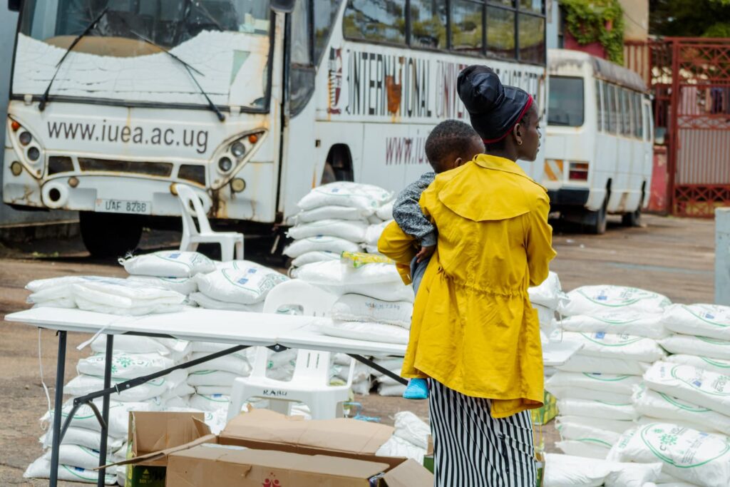 young mother  collecting her relief package